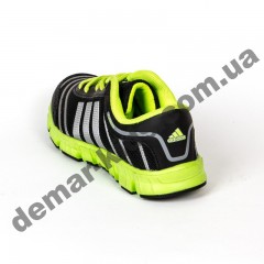 Детские кроссовки Adidas черно-зеленые шнурок